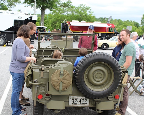 Kids got to climb into World War II vehicles like this jeep.