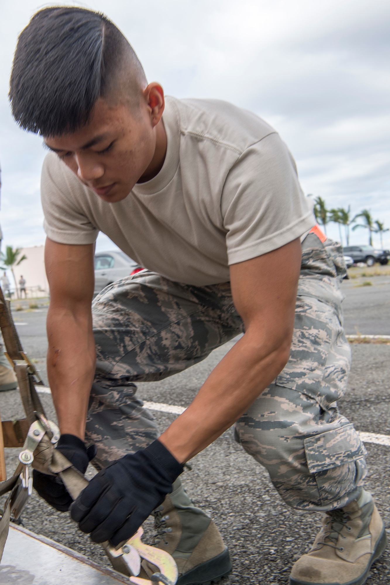 U.S. Air Force Senior Airman John Bonilla, a member of the Air Force Reserve’s 48th Aerial Port Squadron, straps down equipment during a pallet building training exercise designed to perfect his skills as air transportation specialist Oct. 13, 2018, at Joint Base Pearl Harbor-Hickam, Hawaii. The 48th APS, which is part of the 624th Regional Support Group, deploys qualified personnel to provide air terminal operations worldwide in support of contingency operations, exercises, unit moves, and foreign humanitarian relief or disaster operations. (U.S. Air Force photo by Master Sgt. Theanne Herrmann)