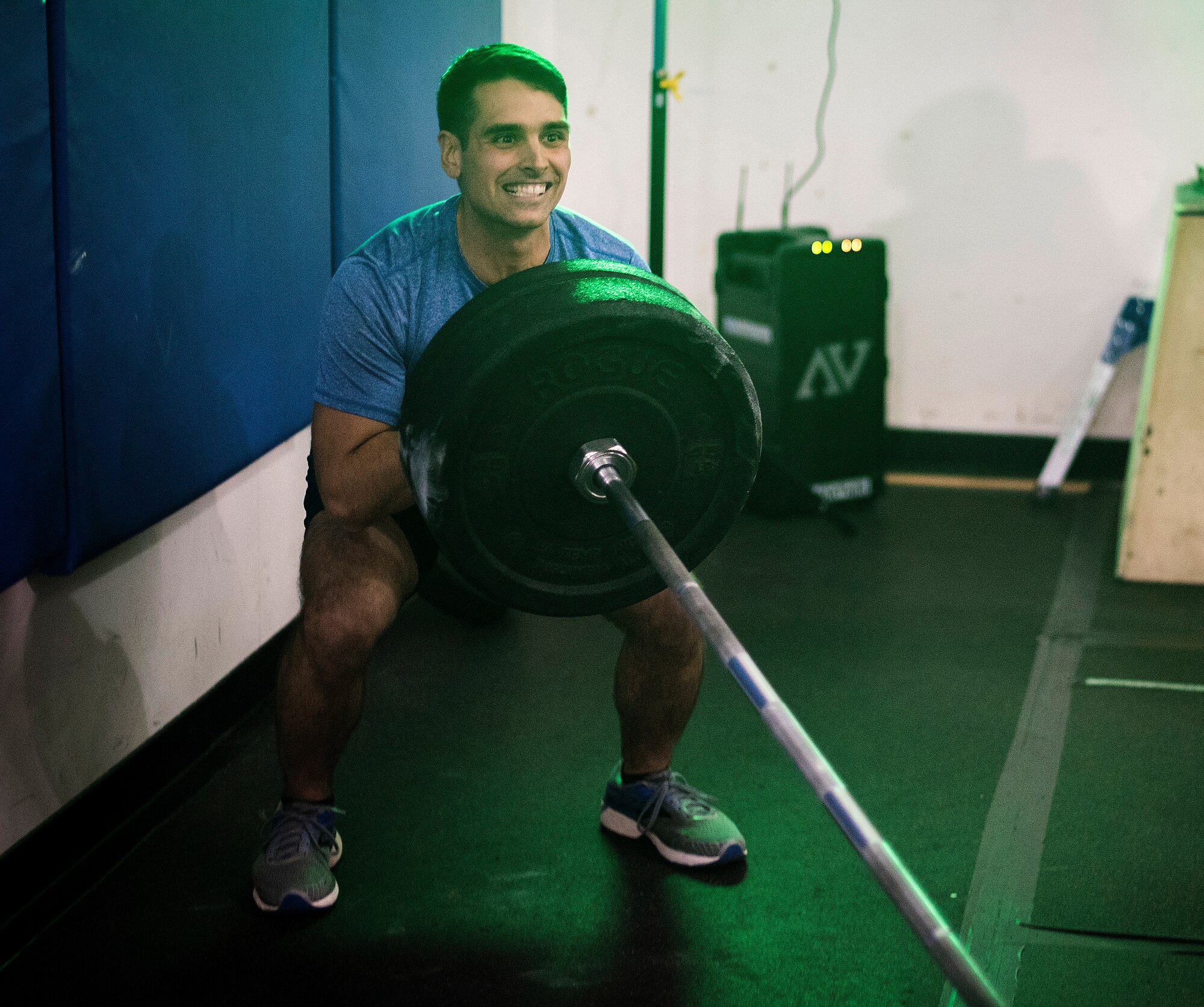 U.S. Air Force Senior Airman Luke Milano, 100th Air Refueling Wing Public Affairs photojournalist, performs 70-pound landmine squats during the Alpha Warrior Regional competition at RAF Lakenheath, England, Oct. 20, 2018. The top 50 competitors throughout the Air Force earn a spot at the Alpha Warrior finals in San Antonio. (U.S. Air Force photo by Tech. Sgt. Emerson Nuñez)