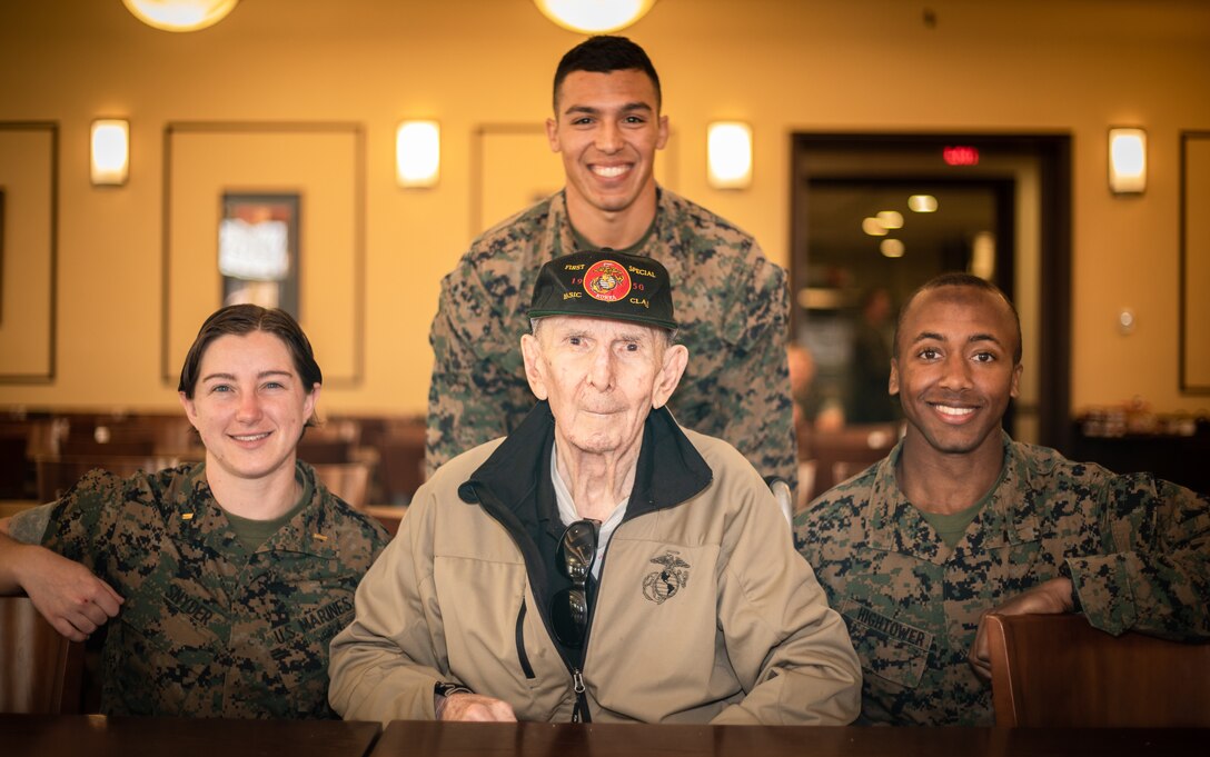 U.S Marine veteran, Louis Buttell, poses for a photo with Marines, Marine Corps Base Quantico, Oct. 18, 2018. The service members got together for the reunion of The Basic School’s first special basic class of 1950, some of whom served together in Korea.