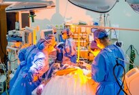 Members of the Joint Base San Antonio Laser Surgery and Scar Center team treat a burn scar patient with a carbon dioxide laser in Wilford Hall Ambulatory Surgical Center at Joint Base San Antonio-Lackland.