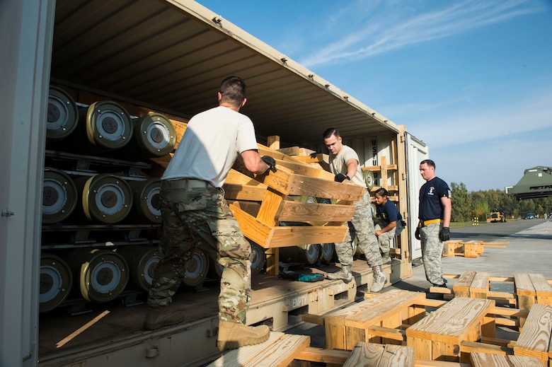 U.S. Airmen assigned to the 86th Munitions Squadron unpack a fresh shipment of munitions on Ramstein Air Base, Germany, Oct. 19, 2018. The 86th MUNS recently received the largest shipment of munitions on Ramstein since 1999. (U.S. Air Force photo by Senior Airman Joshua Magbanua)