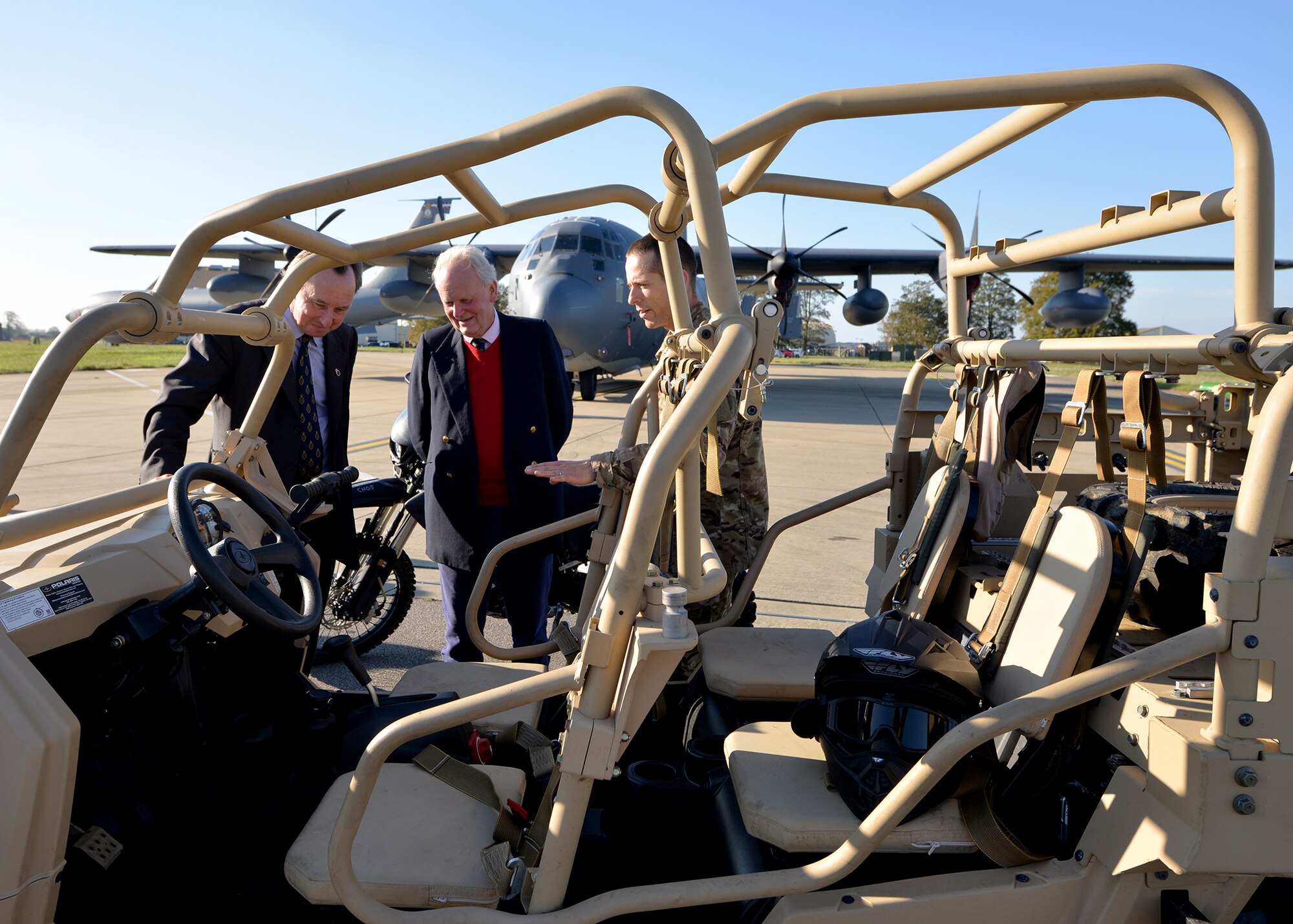George Vestey, left, High Sheriff of Suffolk, and Charles Watt, High Sheriff of Norfolk, talk with a 352nd Special Operations Wing Airman as they check out specialist vehicles from the 321st Special Tactics Squadron during a familiarization visit of RAF Mildenhall Oct. 19, 2018. The High Sheriffs toured three Team Mildenhall aircraft, received two demonstrations from the 100th Security Forces Squadron, spent time in the KC-135 simulator, and met with base leaders and Team Mildenhall Airmen. (U.S. Air Force photo by Karen Abeyasekere)