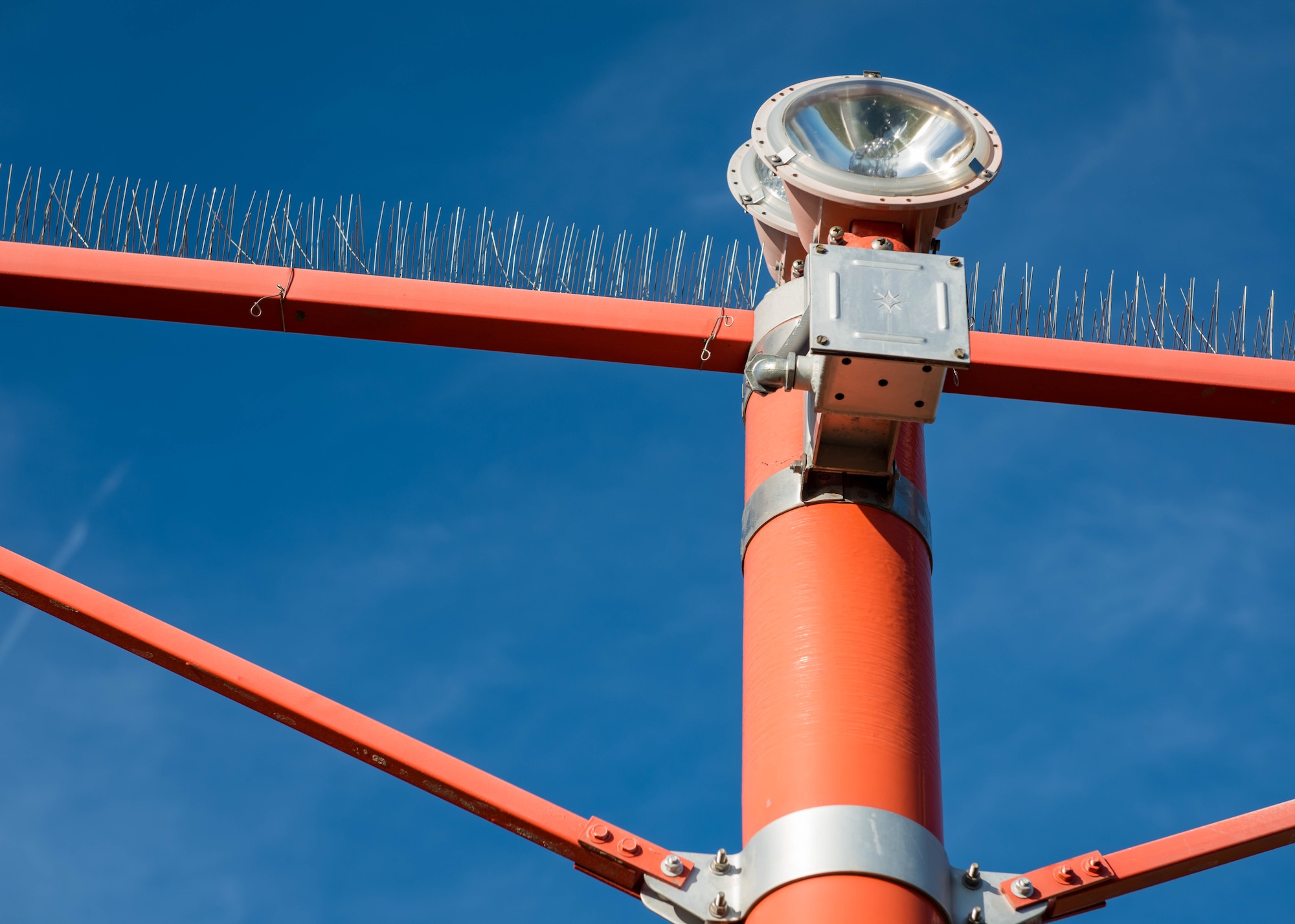 As part of the Bird Aircraft Strike Hazard program, bird spikes were set to prevent birds from perching on the approach lights at Joint Base Langley-Eustis, Virginia.