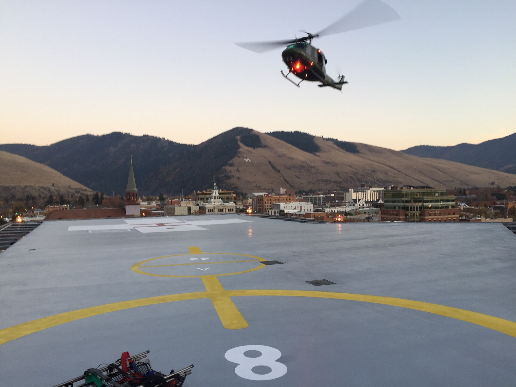 A UH-1N helicopter lands for patient drop off at St. Patrick Hospital and Health Sciences Center Oct. 22, 2018, at Missoula, Mont.