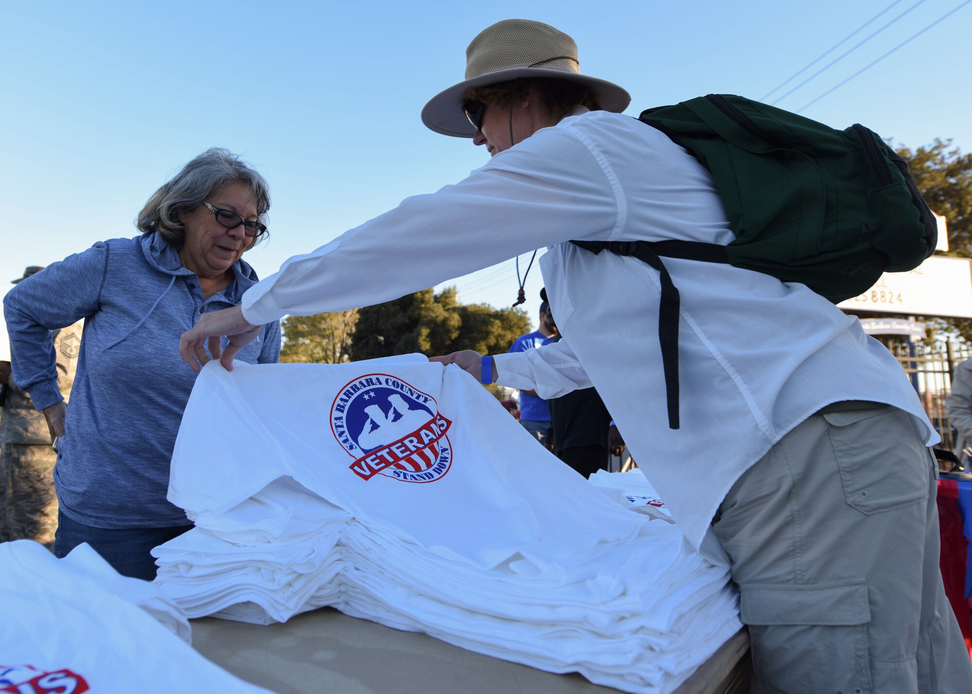 Volunteers at the Veteran Stand Down event get ready for the gates to open and begin assisting veterans Oct. 20, 2018 at Santa Maria Fair Grounds, Calif. The Stand Down is an annual county event that gives back to local veterans.