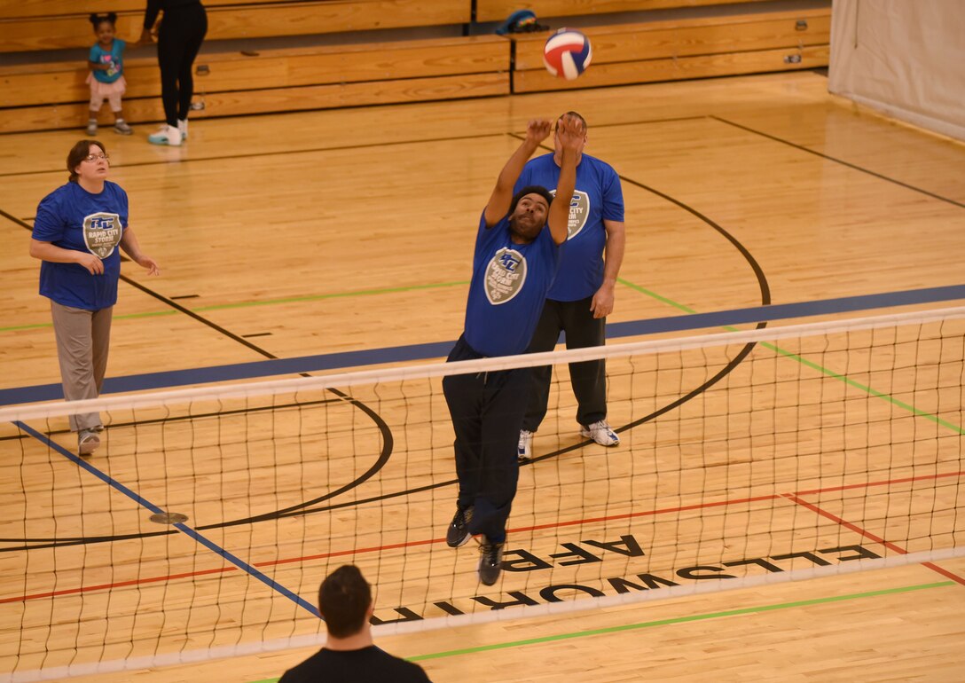 The Rapid City Storm, a Special Olympics sports team, compete against local Airmen during a volleyball tournament at the Bellamy Fitness Center on Ellsworth Air Force Base, S.D., Oct. 20, 2018. The team was invited to Ellsworth AFB in honor of National Disability Employment Awareness Month. (U.S. Air Force photo by Airman 1st Class Christina Bennett)
