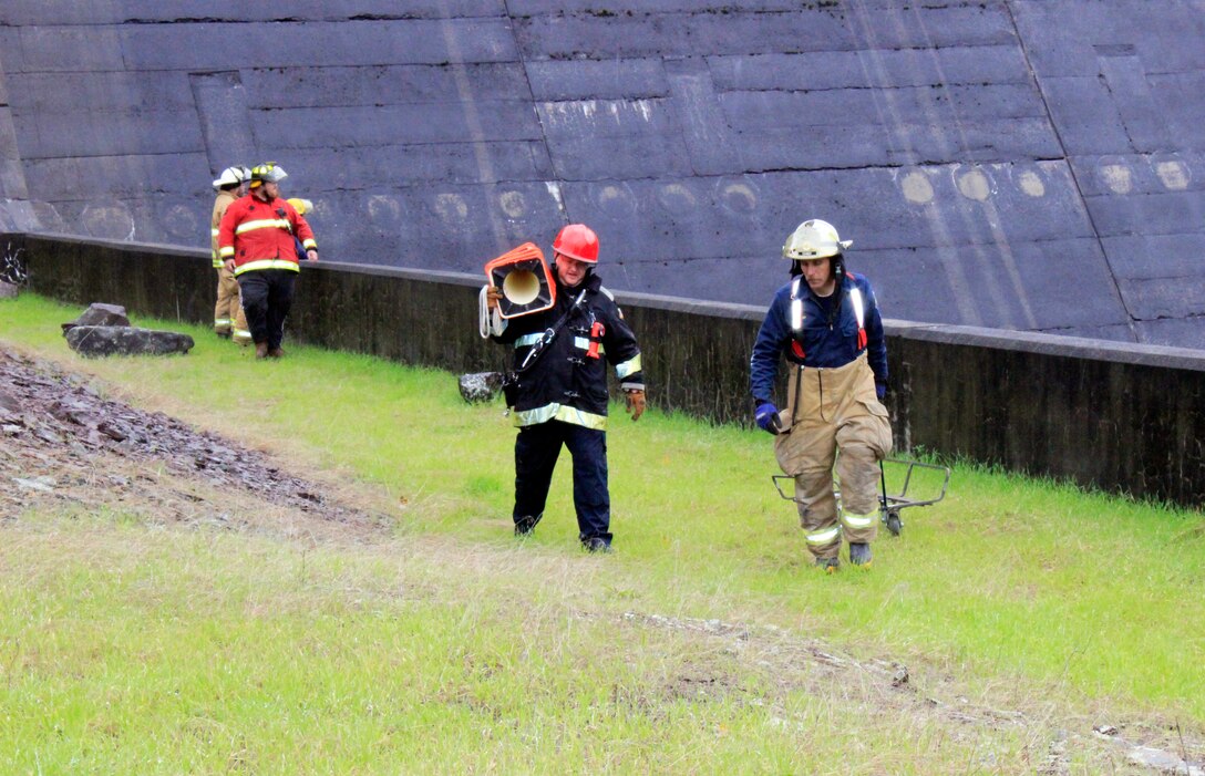 Team members from Wells Bridge, Otego and Unadilla fire departments prepare for a rescue simulation training exercise in support of the U.S. Army Corps of Engineers, Baltimore District, at East Sidney Lake Dam in Delaware County, New York, Oct. 13, 2018.  (U.S. Army photo by Brianna K. Dandridge)