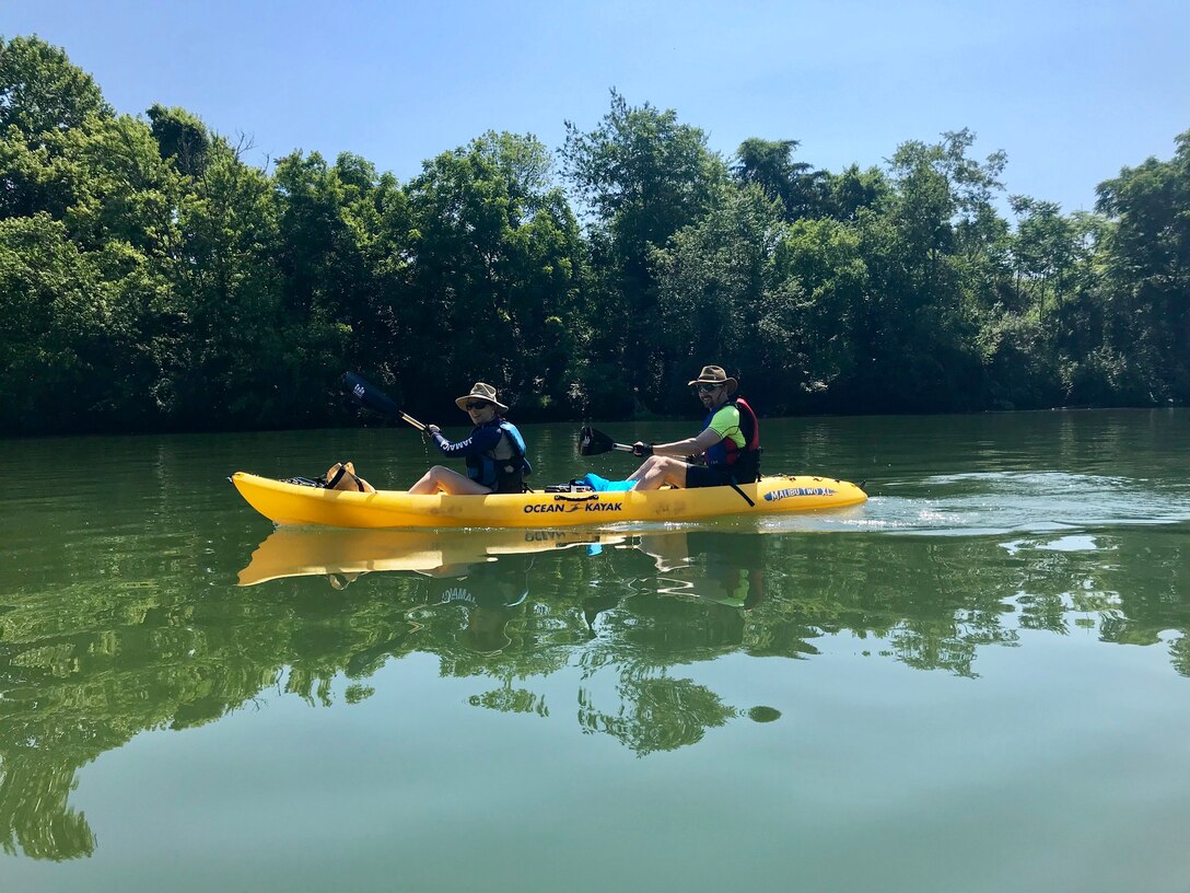 Mark Elson, geologist with the U.S. Army Corps of Engineers Nashville District, and wife Dawn kayak on the Cumberland River in Gainesboro, Tenn., June 16, 2018 on Leg 24 of a 650.4-mile journey of the Cumberland River. The objective of navigating the waterway was to celebrate the 130th Anniversary of the U.S. Army Corps of Engineers Nashville District, reflect on the development of the Cumberland River Basin, remember the past, enjoy the present, and dream about the future of the waterway that is vitally important to the region. (USACE Photo)