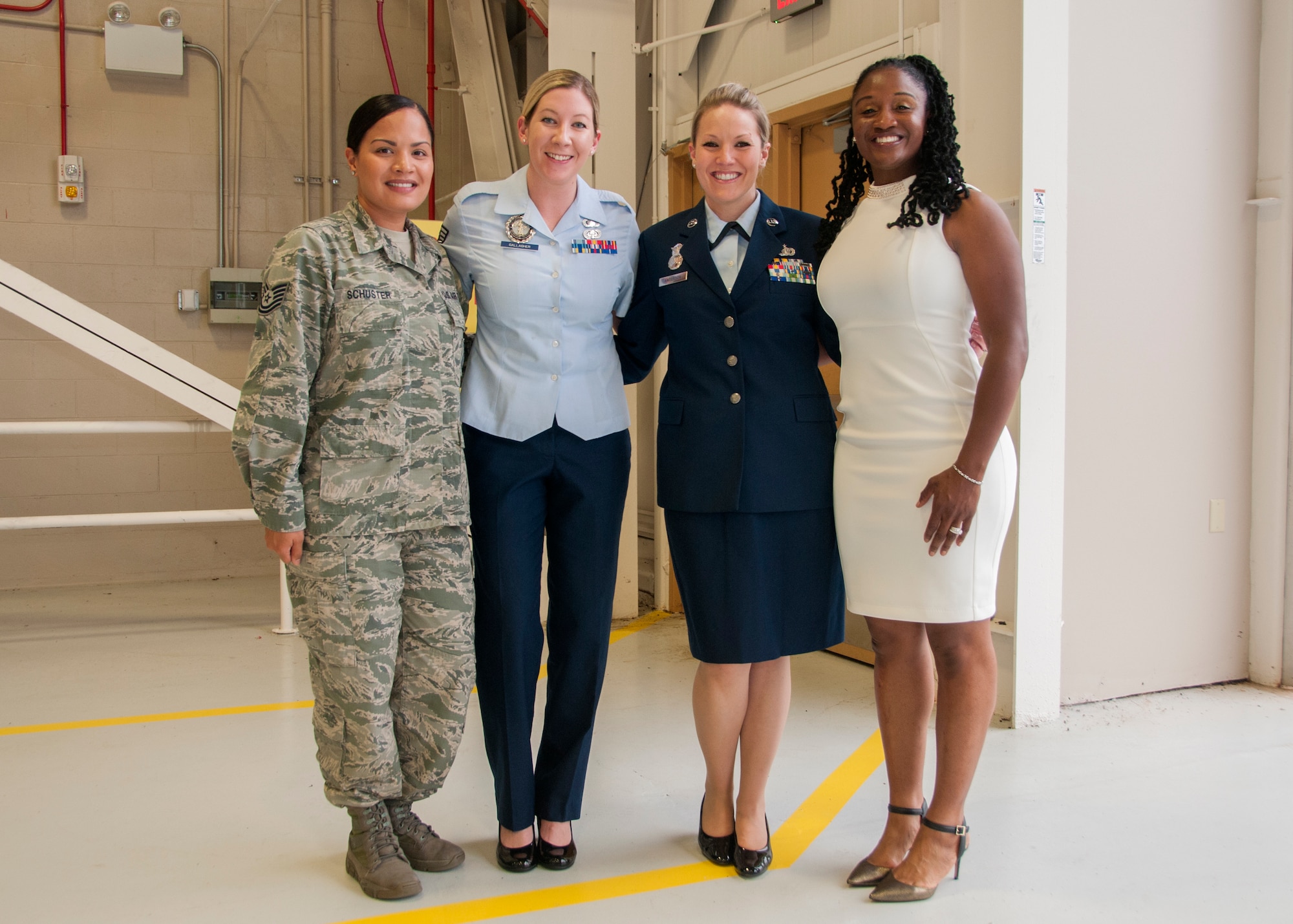 Tysha M. Wiggins, Chimia Coleman and London Lindo pose for a picture after Wiggins enlisted into the 104th Maintenance Group as a crew chief Oct. 11, 2018, at Barnes Air National Guard Base, Massachusetts. Wiggins and her family chose to join the 104th Fighter Wing because of the family orientated environment. (U.S. Air National Guard Photo by Airman 1st Class Randy Burlingame)