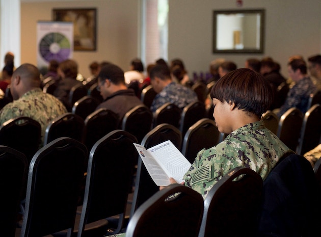 Members of the Joint Base Charleston and local community attend a Domestic Violence Awareness Month event Oct. 23, 2018, at the Red Bank Club at Joint Base Charleston – Weapons Station, S.C.