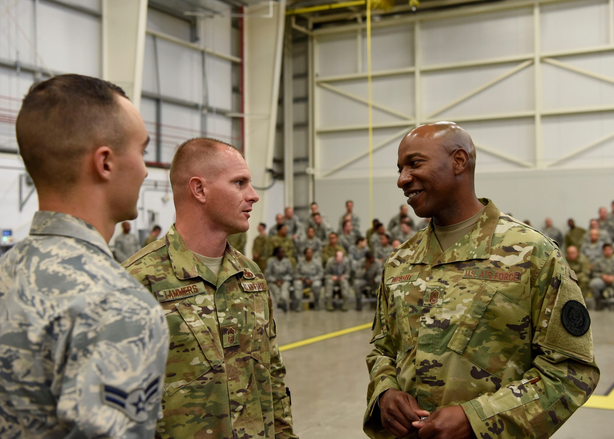 Chief Master Sgt. Matthew Lammers, 56th Aircraft Maintenance Squadron superintendent and Chief Master Sgt. of the Air Force Kaleth O. Wright speak during a tour of the 56th Maintenance Group Oct. 22, 2018 at Luke Air Force Base, Ariz.