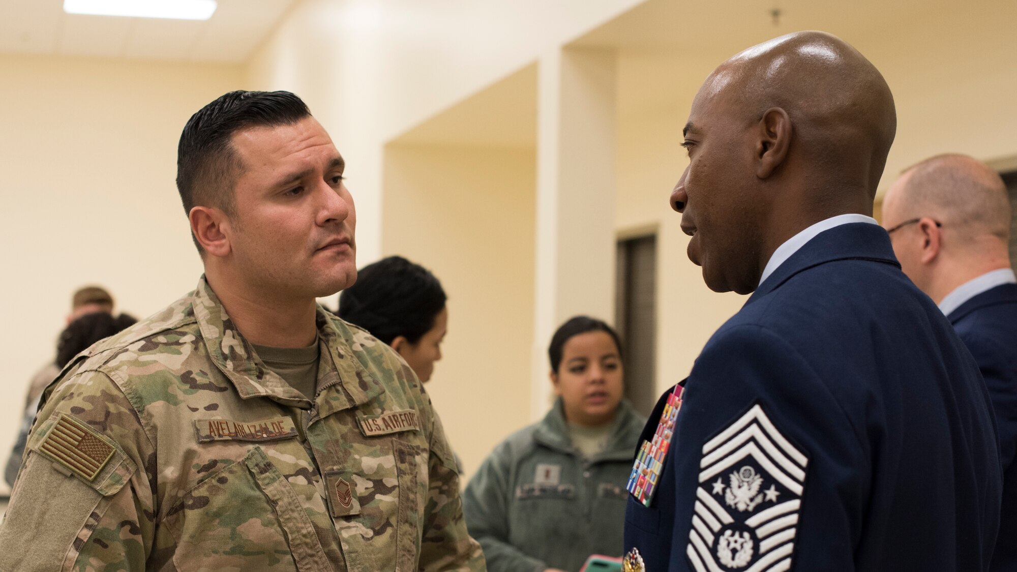 Chief Master Sgt. of the Air Force Kaleth O. Wright speaks one-on-one with Airmen during an intermission of the Congressional Military Family Summit at Fairchild Air Force Base, Washington, Oct. 17, 2018. Chief Wright was a part of the senior enlisted panel discussion and also took the time to interact with Team Fairchild Airmen between sessions. (U.S. Air Force photo/ Senior Airman Ryan Lackey)