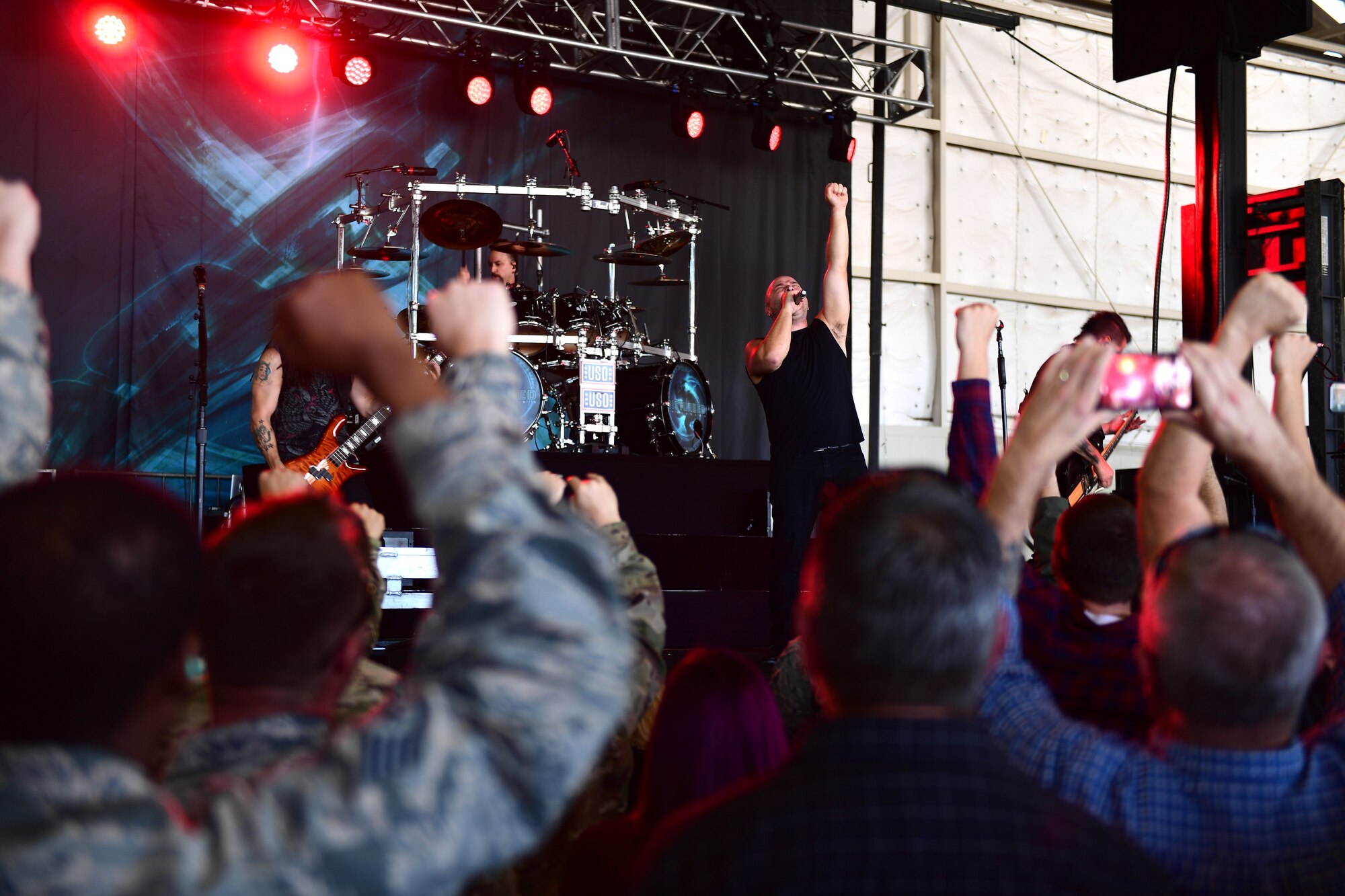 Disturbed performs for Creech Air Force Base Airmen Oct. 23, 2018. Disturbed came to Creech via the USO and performed a concert for Creech Airmen after learning about the wing mission. (U.S. Air Force photo by Senior Airman Christian Clausen)