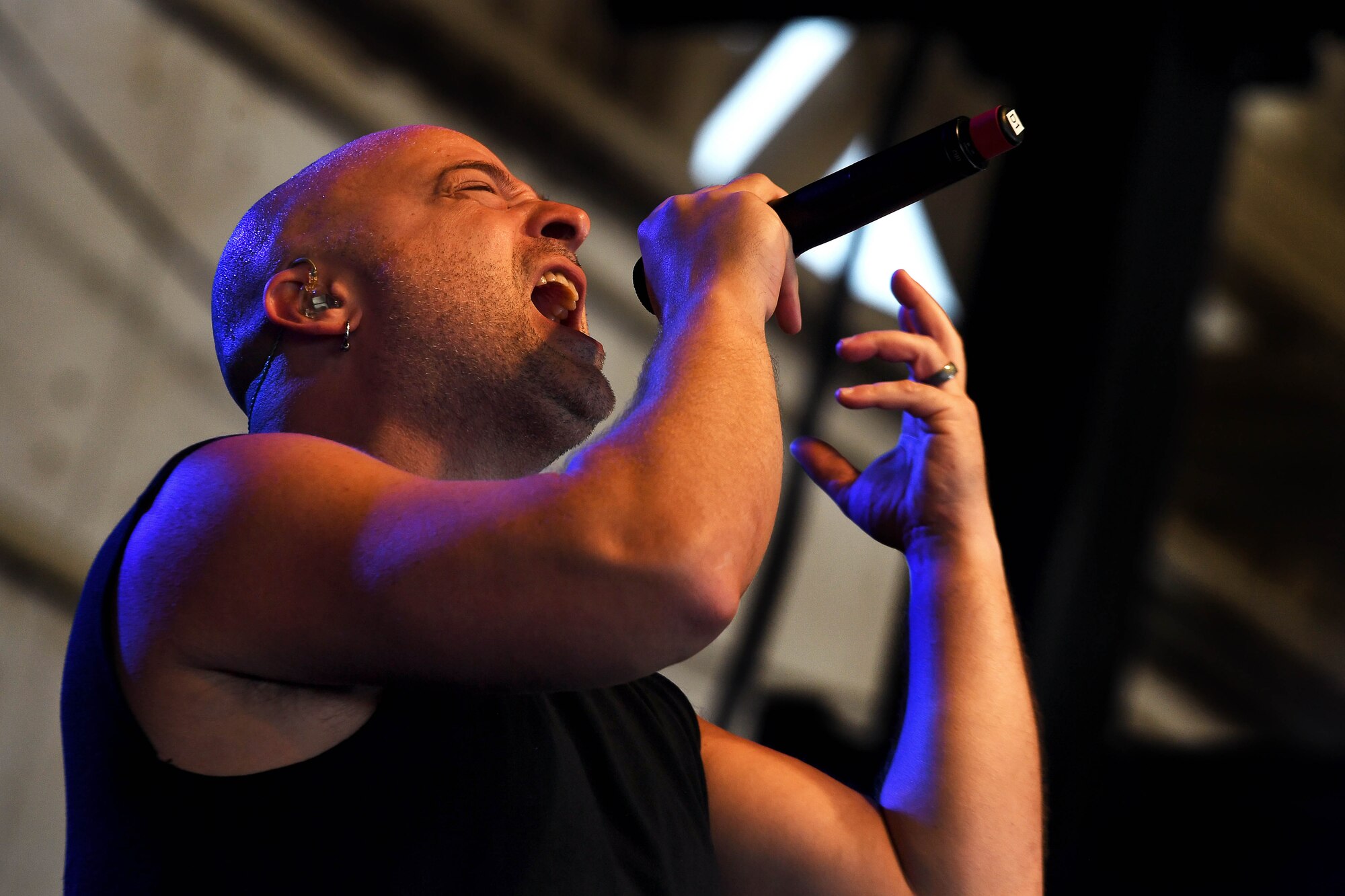 David Draiman, Disturbed lead vocalist, performs for Creech Air Force Base Airmen Oct. 23, 2018. Disturbed partnered with the USO to perform a concert for Creech Airmen after learning about the wing mission. (U.S. Air Force photo by James Thompson)