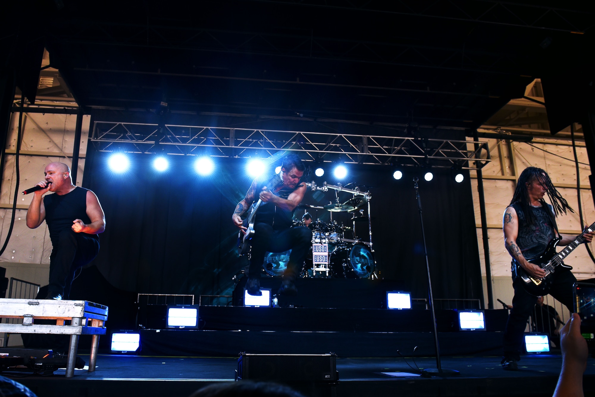 Disturbed performs for Creech Air Force Base Airmen Oct. 23, 2018. Disturbed partnered with the USO to perform a concert for Creech Airmen after learning about the wing mission. (U.S. Air Force photo by James Thompson)
