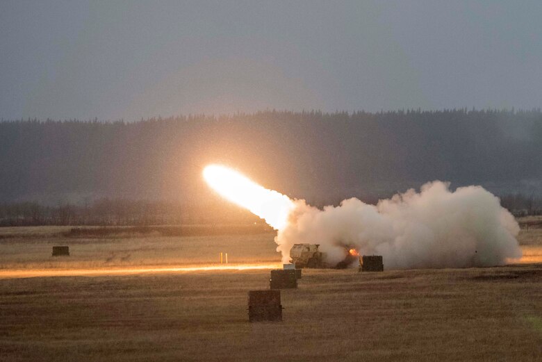 U.S. Army Soldiers assigned to Alpha Battery, 3rd Battalion, 27th Field Artillery Regiment (HIMARS), 18th Field Artillery Regiment, Fort Bragg, N.C., fire a M142 High Mobility Artillery Rocket System at Fort Greely, Alaska, Oct. 19, 2018, during Red Flag-Alaska 19-1. Their unit was tasked to provide long-range artillery support during RF-A, allowing the unit to showcase its capabilities and develop relationships with other services. Some capabilities of the M142 HIMARS include long-range lethality, the ability to be loaded unto an aircraft and flown anywhere location in the world, and extreme range precision to reduce collateral damage.