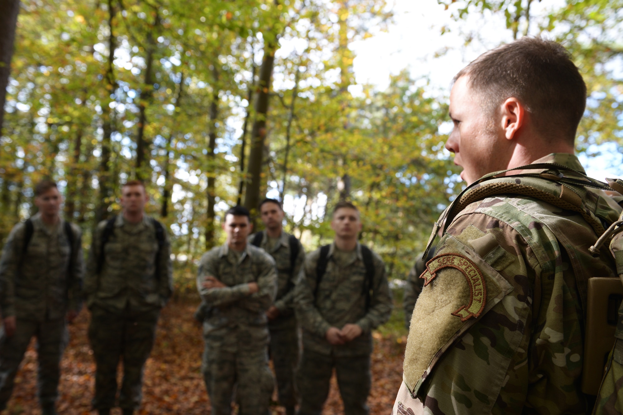 Tech. Sgt. Dereck Day, a 48th Operations Support Squadron Survival, Evasion, Resistance and Escape specialist, briefs a group of Airmen during SERE training at Royal Air Force Lakenheath, England, Oct. 18, 2018. The SERE instructors conducted RAF Lakenheath’s first training program open to non-aircrew personnel. (U.S. Air Force photo by Airman 1st Class Shanice Williams-Jones)