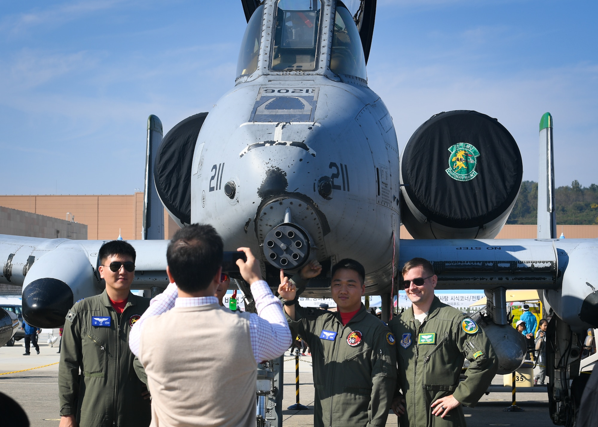 Visitors pose for photos with the aircrew of an A-10 Thunderbolt II at the Gyeongnam Sacheon Aerospace Expo at Sacheon Air Base, Republic of Korea, Oct. 25, 2018.