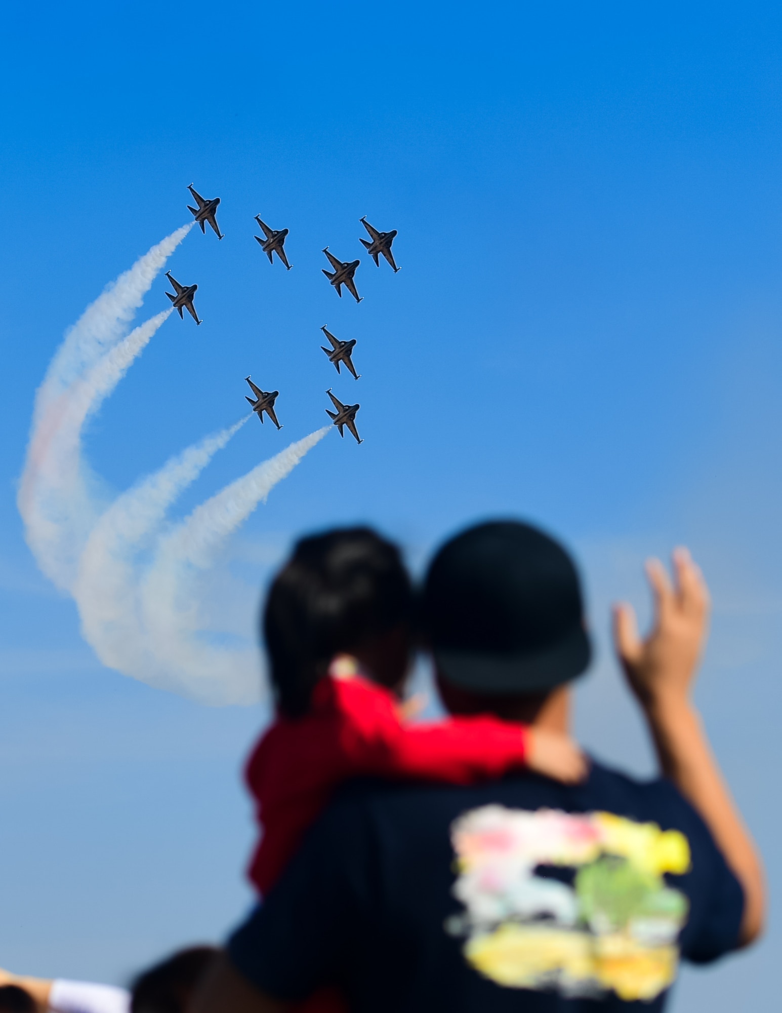 Spectators watch the Republic of Korea’s 53rd Demonstration Group, also known as the Black Eagles, perform at the Gyeongnam Sacheon Aerospace Expo at Sacheon Air Base, South Korea, Oct. 25, 2018.