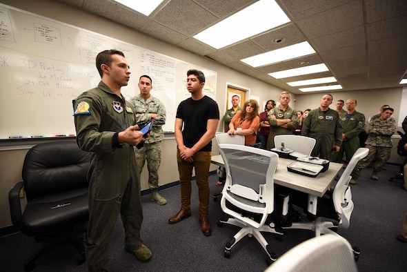 Capt. Phillip Huebner, 37th Flying Training Squadron instructor pilot, speaks during the Spark Cell grand opening Oct. 19, 2018, on Columbus Air Force Base, Mississippi. The innovation team is requiring all individuals interested in 3D printing to get signed off by a Spark Cell member first to help protect the equipment. (U.S. Air Force photo by Airman 1st Class Keith Holcomb)