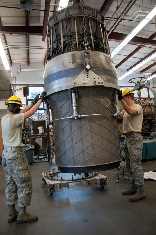 Senior Airman Andrew Feighery, 104th Maintenance Squadron aircraft engine mechanic, removes an augmenter module Oct. 17, 2018, at Barnes Air National Guard Base, Massachusetts. Feighery's recent deployment experience and mechanical engineering studies at The University of Massachusetts have further developed his skills as a mechanic. (U.S. Air National Guard Photo by Airman 1st Class Randy Burlingame)