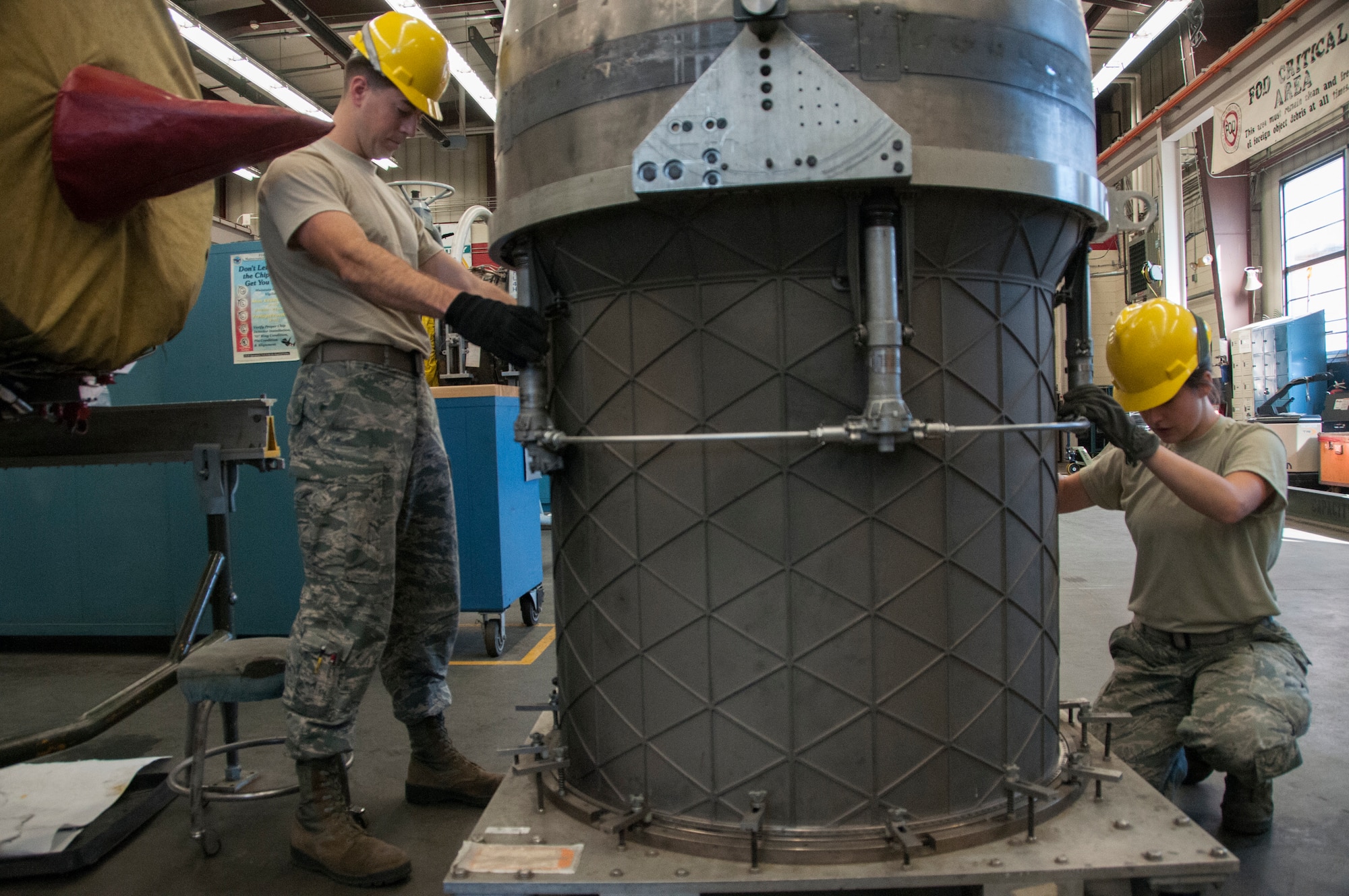 Senior Airman Andrew Feighery, 104th Maintenance Squadron aircraft engine mechanic, removes an augmenter module Oct. 17, 2018, at Barnes Air National Guard Base, Massachusetts. Feighery's recent deployment experience and mechanical engineering studies at The University of Massachusetts have further developed his skills as a mechanic. (U.S. Air National Guard Photo by Airman 1st Class Randy Burlingame)