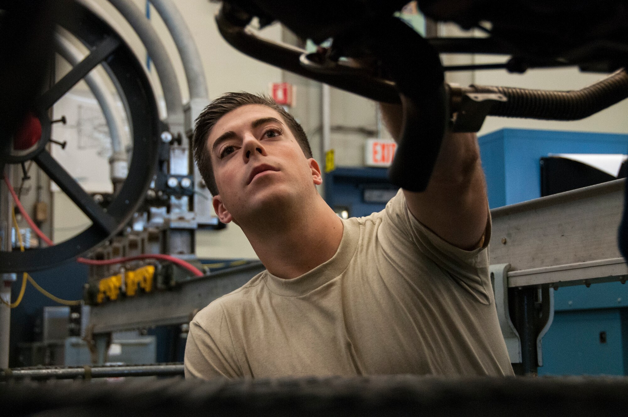Senior Airman Andrew Feighery, 104th Maintenance Squadron aircraft engine mechanic, removes an augmenter module Oct. 17, 2018, at Barnes Air National Guard Base, Massachusetts. Feighery's recent deployment experience and mechanical engineering studies at The University of Massachusetts have further developed his skills as a mechanic. (U.S. Air National Guard Photo by Airman 1st Class Randy Burlingame)