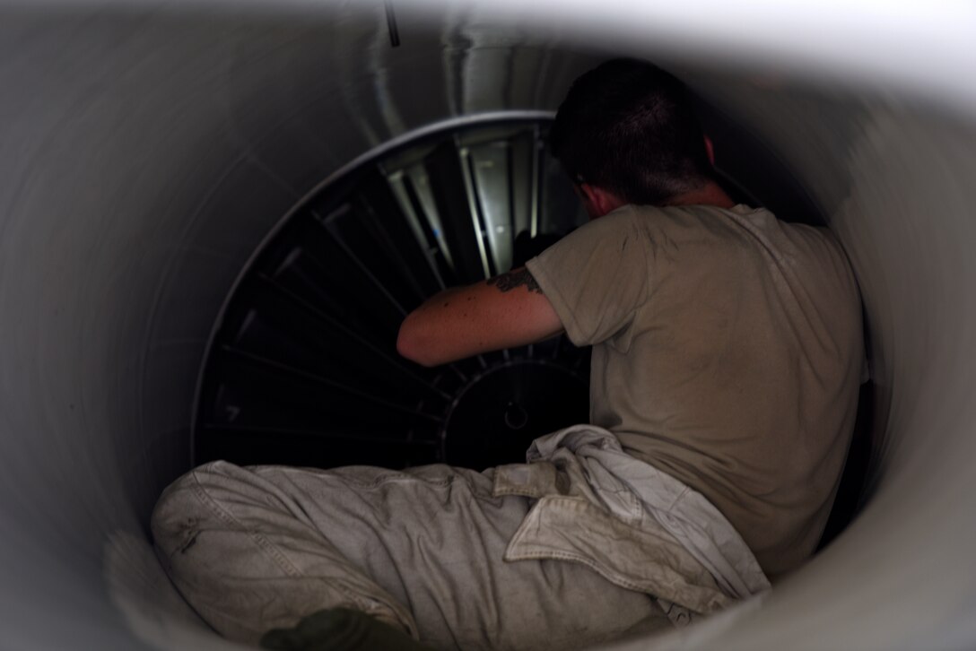 U.S. Air Force Staff Sgt. Samuel Metzger, a crew chief assigned to the 180th Fighter Wing, Ohio Air National Guard, inspects the intake of an F-16 Fighting Falcon Sept. 17, 2018 during Combat Archer, a two-week air-to-air Weapons System Evaluation Program to prepare and evaluate operational fighter squadrons' readiness for combat operations, at Tyndall Air Force Base, Florida. Combat Archer equips 180FW Airmen with the skills they need to protect of the American homeland and provide increased capability to the Combatant Commander. (U.S. Air National Guard photo by Staff Sgt. Shane Hughes)