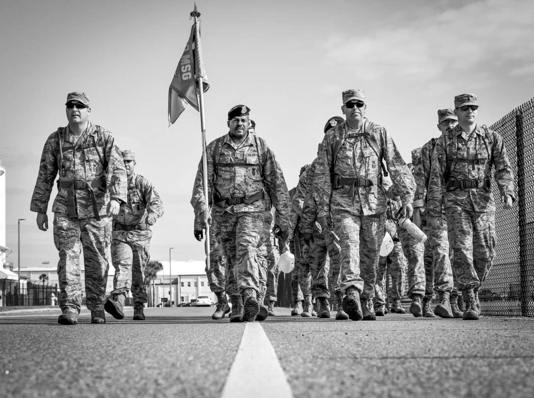 Security forces defenders from the 920th Rescue Wing, Patrick Air Force Base, Florida, put together an array of teambuilding activities as a way to say farewell to Chief Master Sgt. Stacie Moore, 920th SFS enlisted manager, on his retirement October 13, 2018. Events included rucking, running and all-around physical fitness as a way to pay tribute to his leadership. U.S. Air Force photo by Senior Airman Brandon Kalloo Sanes