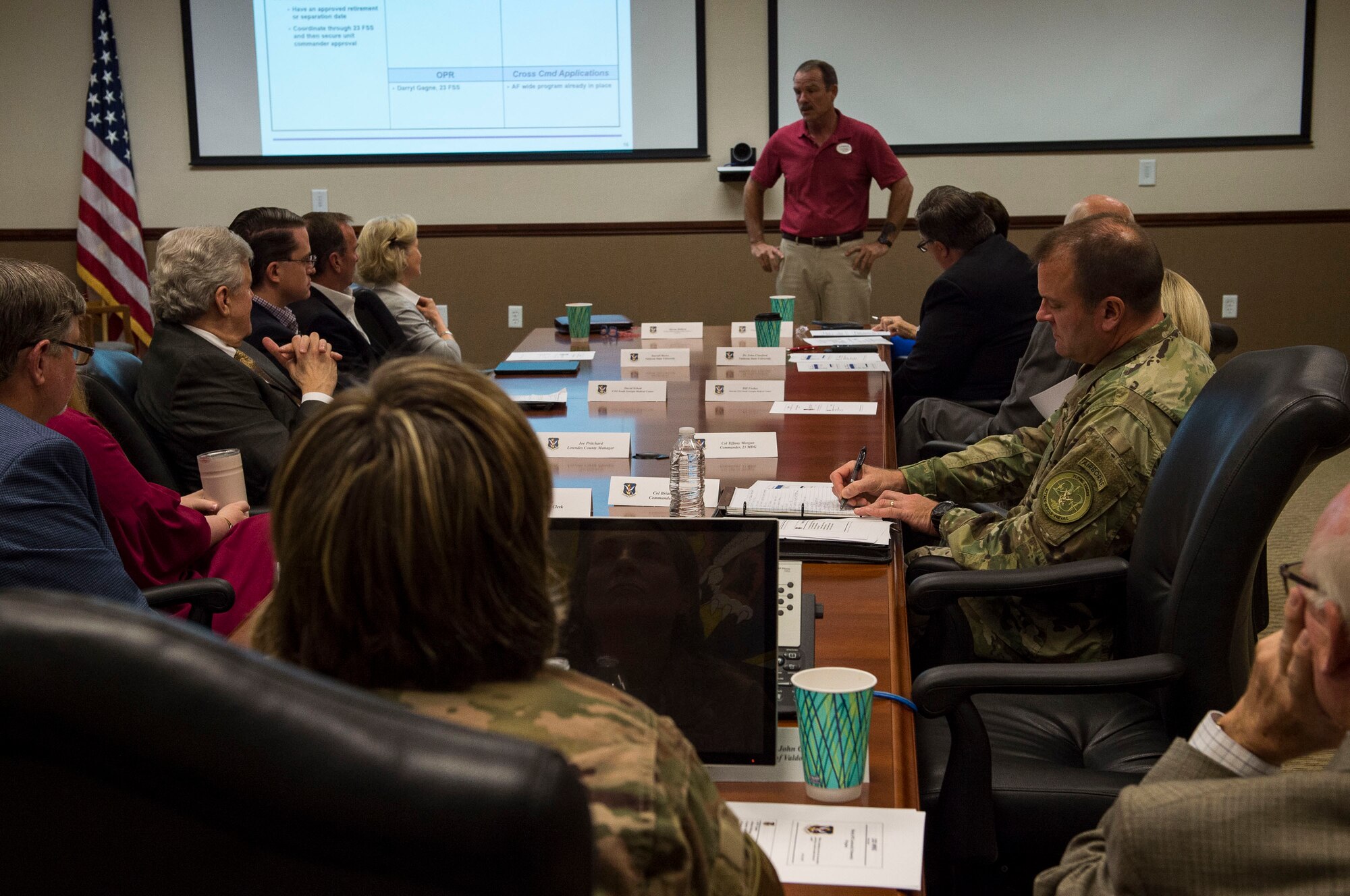 Darryl Gagne, 23d Force Support Squadron education specialist, briefs members of the Moody Community Partnership Committee (MCPC), during a meeting, Oct. 24, 2018. The MCPC creates mutually beneficial partnerships to help Moody and Lowndes County save money, which is permitted through the Air Force public-public, public-private, or P4 initiative.  (U.S. Air Force photo by Senior Airman Janiqua P. Robinson)
