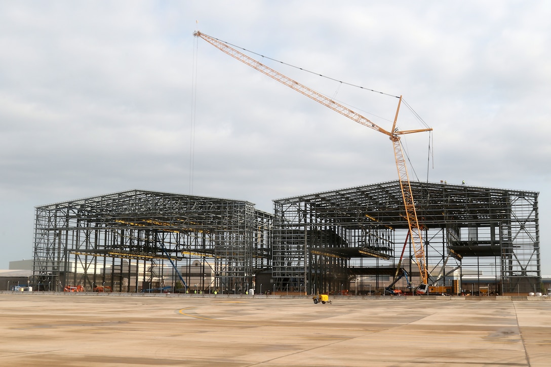 Tulsa District, U.S. Army Corps of Engineer contractors work to construct a two bay hangar for the Boeing KC-46A at Tinker Air Force Base, August 15, 2018.  Constructed on a Boeing 767 airframe, the Pegasus is taller, longer and has a larger wingspan than the 707-based airframe of the KC-135 Stratotanker.  Construction on the multi-phase KC-46A project at Tinker is expected to run through fiscal year 2029, with final construction providing hangar space for 14 separate KC-46A aircraft.  (Released/Official U.S. Army Photo By: Preston L. Chasteen)