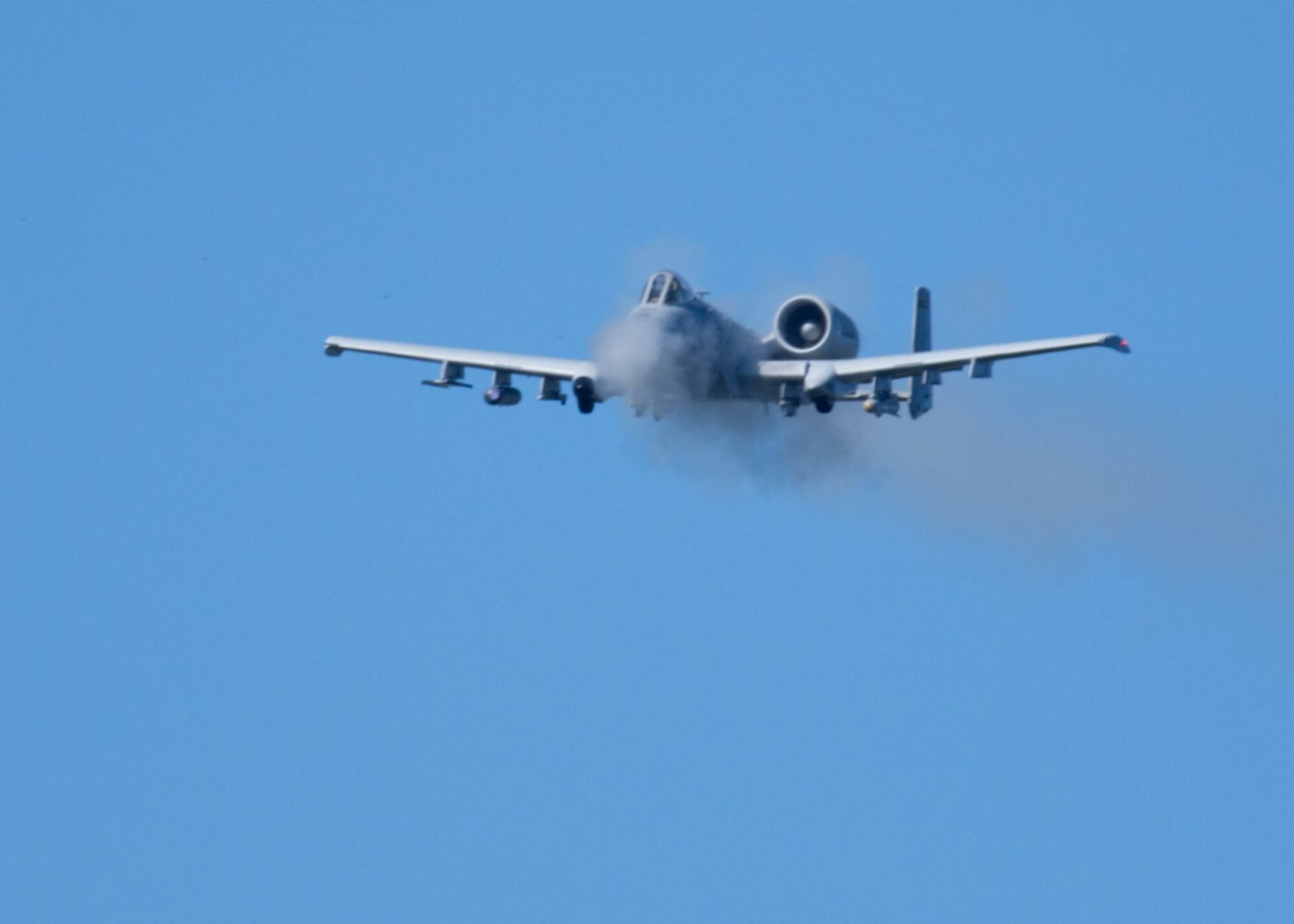 An A-10 Thunderbolt II pilot with the 163d Fighter Squadron, Fort Wayne Air National Guard Base, Ind., makes a strafe pass during Hawgsmoke at Cannon Range, Mo., Oct. 18, 2018. The competition is a biennial worldwide A-10 bombing, missile and tactical gunnery competition derived from the discontinued "Gunsmoke" Air Force Worldwide Gunnery Competition. The 74th FS brought home the top overall team award, Top Tactical and Top Conventional team awards. Based on their winning performance, Moody is slated to host the next Hawgsmoke in 2020. (U.S. Air Force photo by Senior Airman Missy Sterling)