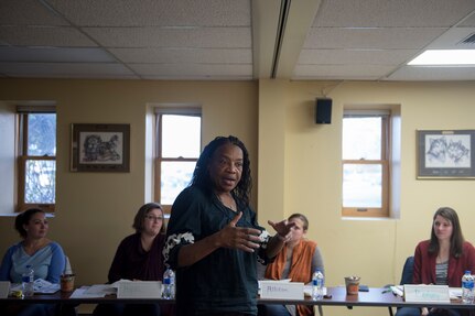 Mary Jernigan, 673d Air Base Wing violence prevention integrator, talks to a group of aspiring key spouses during Key Spouse Initial Training at Joint Base Elmendorf-Richardson, Alaska, Oct. 16, 2018. Key Spouses are selected by unit commanders to provide support for their squadron's families.