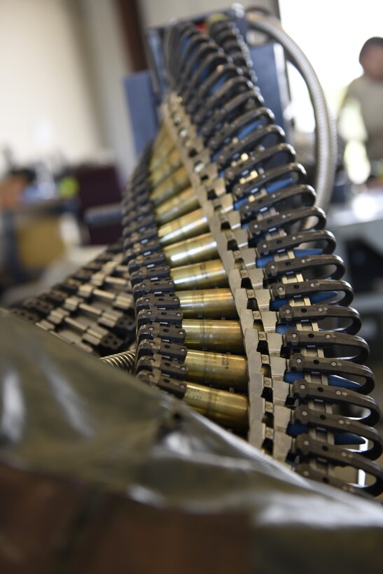 20 mm ammunition is unloaded from a gun truck Sept. 19, 2018 during Combat Archer, a two-week air-to-air Weapons System Evaluation Program to prepare and evaluate operational fighter squadrons' readiness for combat operations, at Tyndall Air Force Base, Florida. Combat Archer equips 180FW Airmen with the skills they need to protect of the American homeland and provide increased capability to the Combatant Commander. (U.S. Air National Guard photo by Staff Sgt. Shane Hughes)