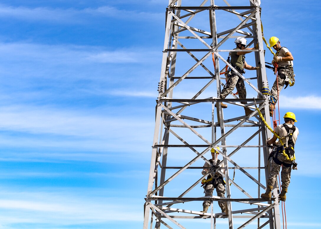 364th Training Squadron cable and antenna systems apprentice course students climb a communications tower to perform a ground based tower rescue
