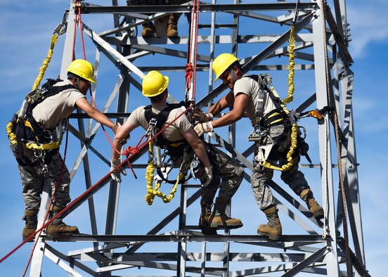 364th Training Squadron cable and antenna systems apprentice course students climb a communications tower to perform a ground based tower rescue