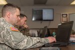 Soldiers from the 146th Cyber Support Team of the Maine Army National Guard train to hack into other computers at Camp Keyes in Augusta, Maine, on Feb.  4, 2018. The 146th Cyber Support Team was created in October of 2017 to increase the safety of the Maine Guard’s technological assets.