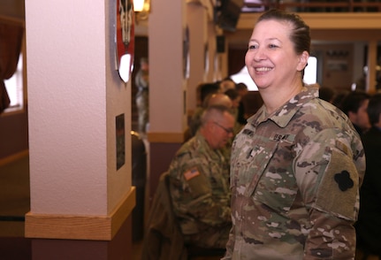 Command Sgt. Maj. Sara E. Noskowiak, Mission Command Support Group command sergeant major, 88th Readiness Division, smiles and socializes after relinquishing responsibility of the U.S. Army Reserve Music Command Sergeant Major to Master Sgt. Keith M. Barlow during a change of responsibility ceremony at Fort McCoy, Wisconsin, Oct. 20, 2018.