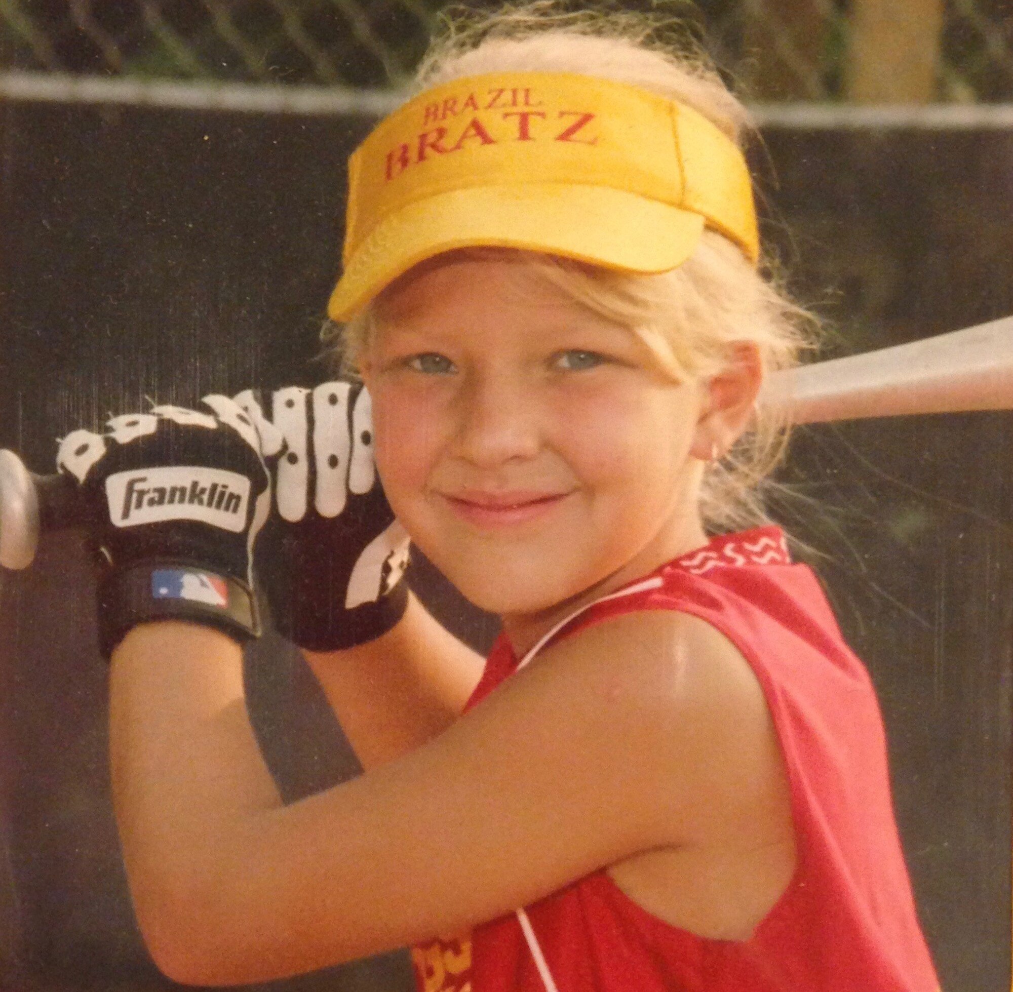 Tori Tilley poses for a softball portrait as a child, in Brazil, Indiana. More than 10 years later Senior Airman Tori Tilley played for the 2018 U.S. Armed Forces Women’s Softball Team. (Courtesy photo)