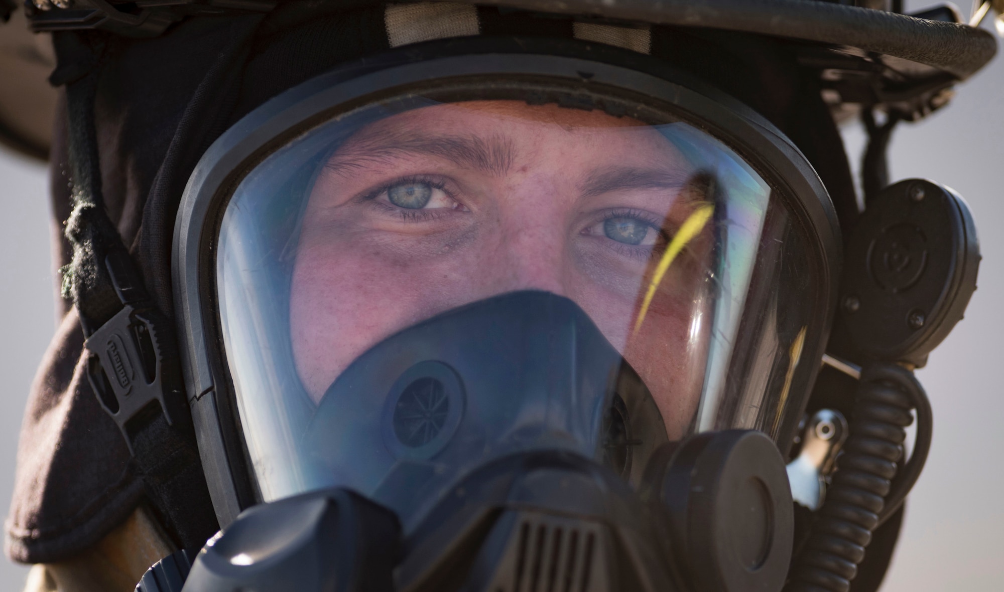 Senior Airman Dalton Kendall, 99th Civil Engineer Squadron firefighter, catches his breath after conducting a firefighter training exercise Oct. 23, 2018, at Nellis Air Force Base, Nev. Kendall was one of more than a dozen Nellis, Creech and Clark County firefighters to participate in the training. (U.S. Air Force photo by Airman 1st Class Andrew D. Sarver)