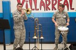 Airmen 1st Class Michael Steiger and Bradley Robinson, U.S. Air Force Band of the West, perform for Villarreal Elementary students Oct. 17, 2018, at San Antonio, Texas.