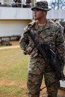 Lance Cpl. Markus Dodd awaits instruction prior to executing the live-fire portion of the fire and movement range Oct. 24, 2018, at Camp Hansen, Okinawa, Japan. During the range, Marines with 3rd Marine Logistics Group practiced their marksmanship skills, improved their communication and worked on their weapons handling while engaging targets. Dodd is a native of Niles, Michigan, is a machine gunner with the Tactical Readiness and Training, G-3, 3rd MLG Headquarters. (U.S. Marine Corps photo by Lance Cpl. Terry Wong)
