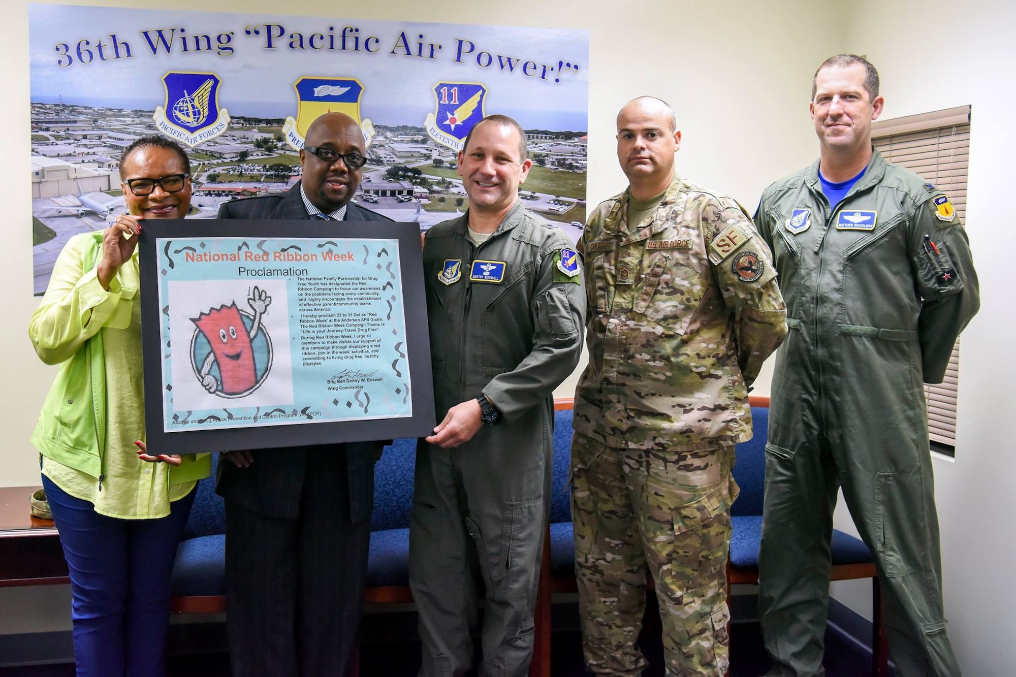 U.S. Air Force Brig. Gen. Gentry Boswell, 36 Wing Commander, signs a proclamation kicking off Red Ribbon week at Andersen Air Force Base, Guam, Oct. 26, 2018. (U.S. Air Force photo by Senior Airman Christopher Quail)