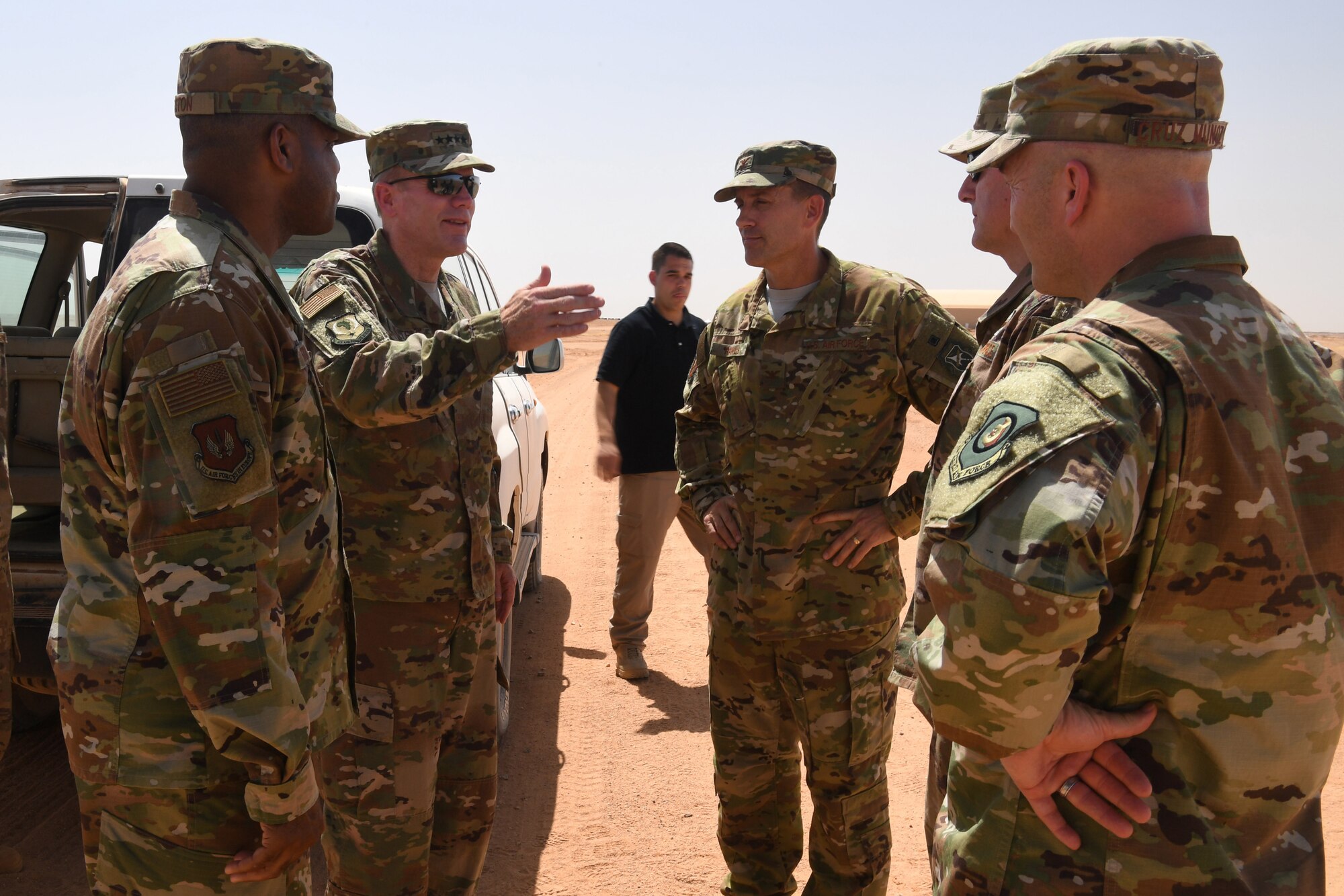 U.S. Air Force Gen. Tod D. Wolters, U.S. Air Forces in Europe-Air Forces Africa commander, and leaders from U.S. Air Forces in Europe-Air Forces Africa, 3rd Air Force, and the 435th Air Expeditionary Wing discuss operations at Nigerien Air Base 201, Niger, Oct. 25, 2018. The tour allowed USAFE-AFAFRICA leadership to see progress at the construction sites and base facilities first-hand. (U.S. Air Force photo by Tech. Sgt. Rachelle Coleman)