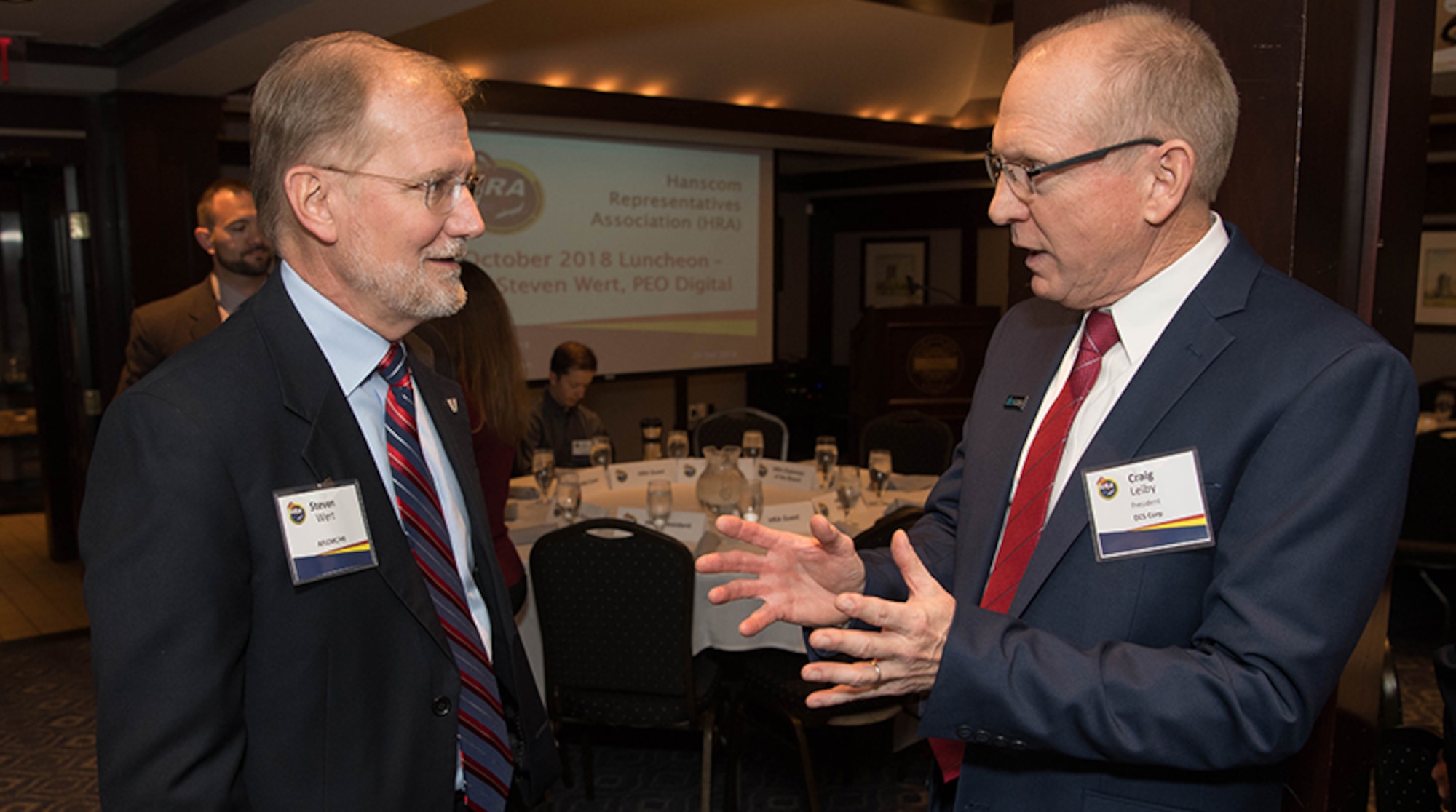 Steven Wert, left, program executive officer Digital speaks with Craig Leiby, right, Air Force account manager for Littleton, Massachusetts based DCS Corp, and Hanscom Representatives Association president at the HRA luncheon Oct. 24 at Waxy’s O’Connor’s Restaurant in Lexington, Mass. Wert’s address at the luncheon was his first local public appearance as PEO Digital since the Air Force’s senior acquisition civilian renamed Battle Management as PEO Digital, a move that represents far more than a name change. (U.S. Air Force photo by Jerry Saslav)