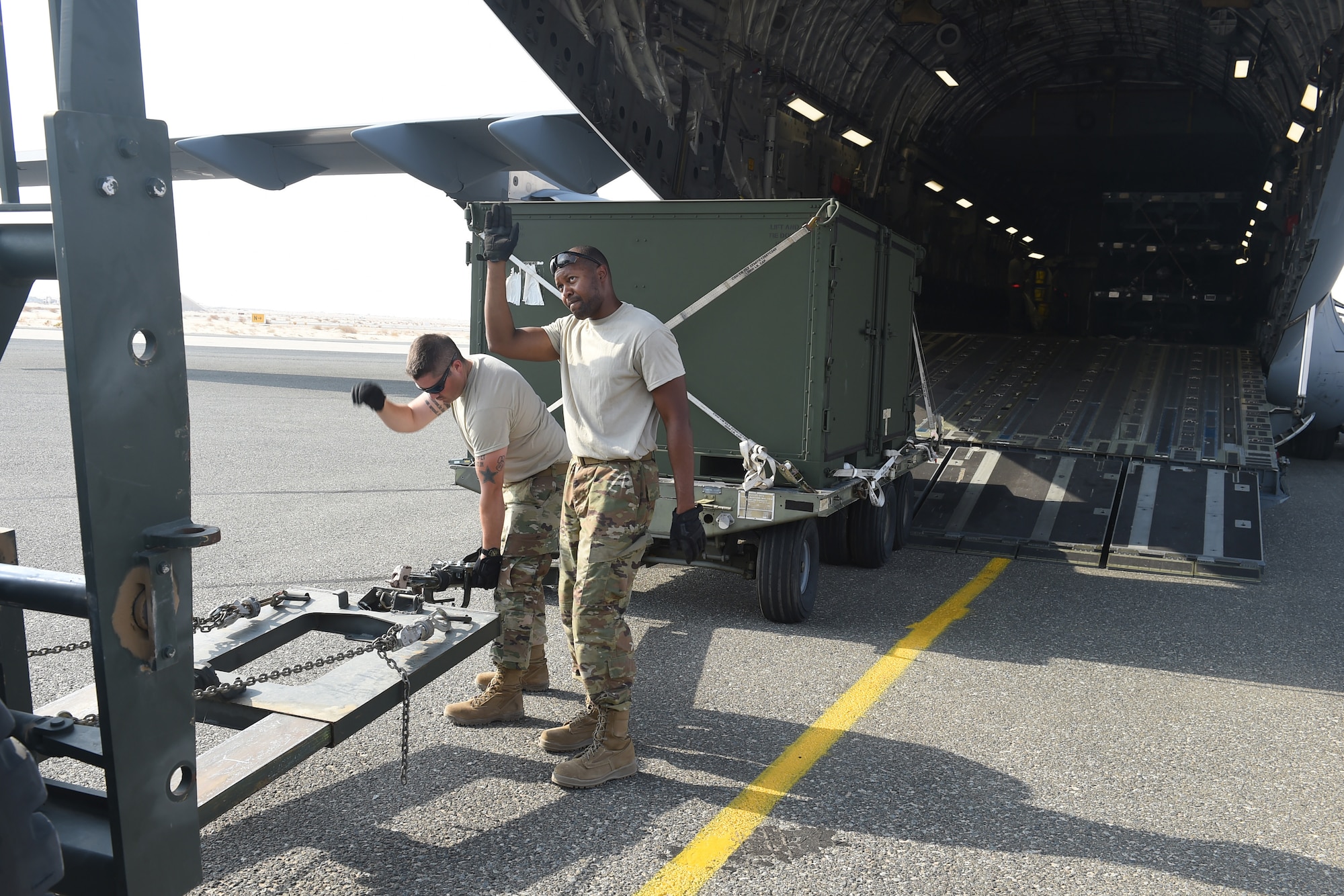Airmen issue mobility bags to new arrivals