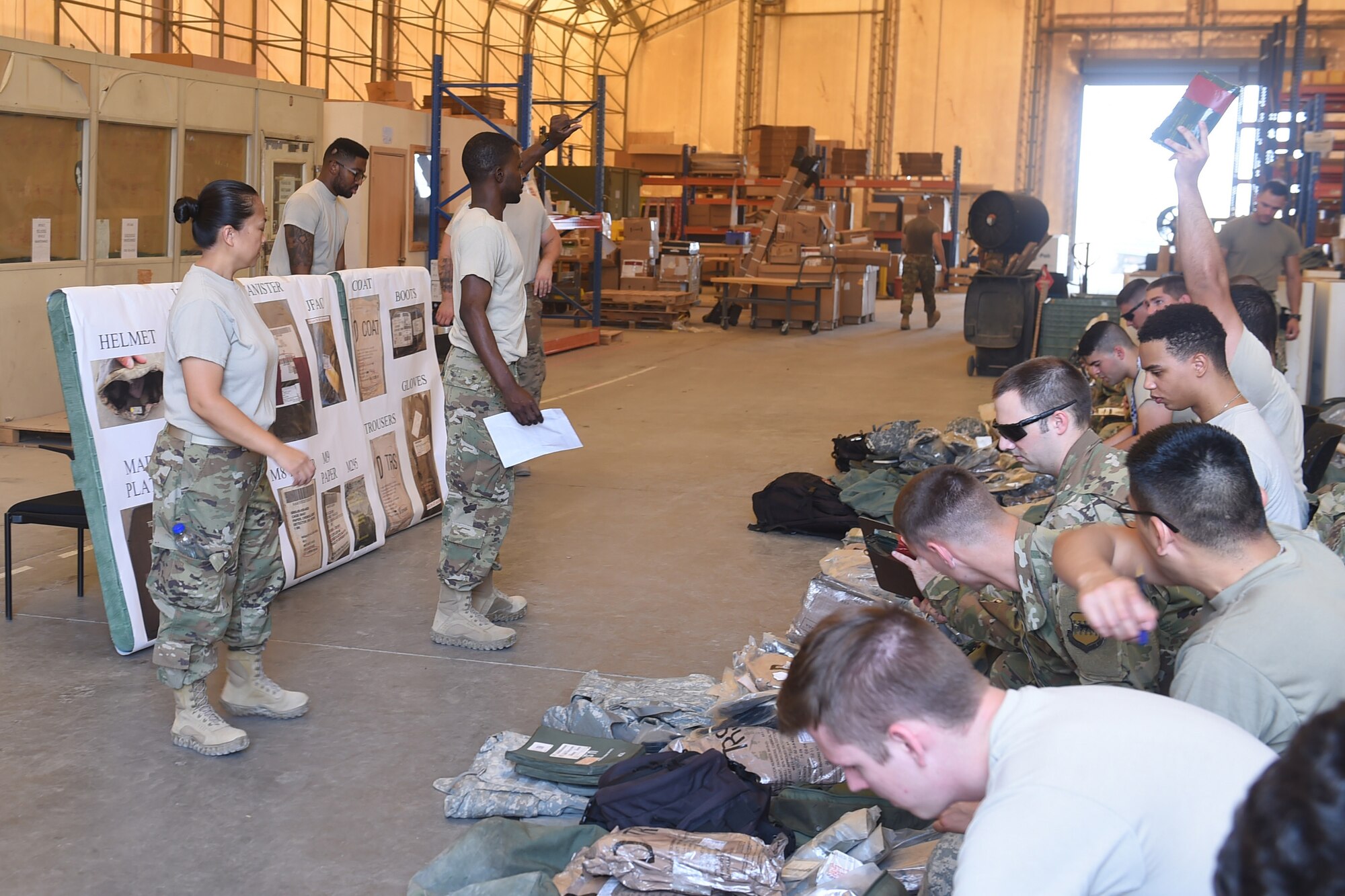 Airmen issue mobility bags to new arrivals