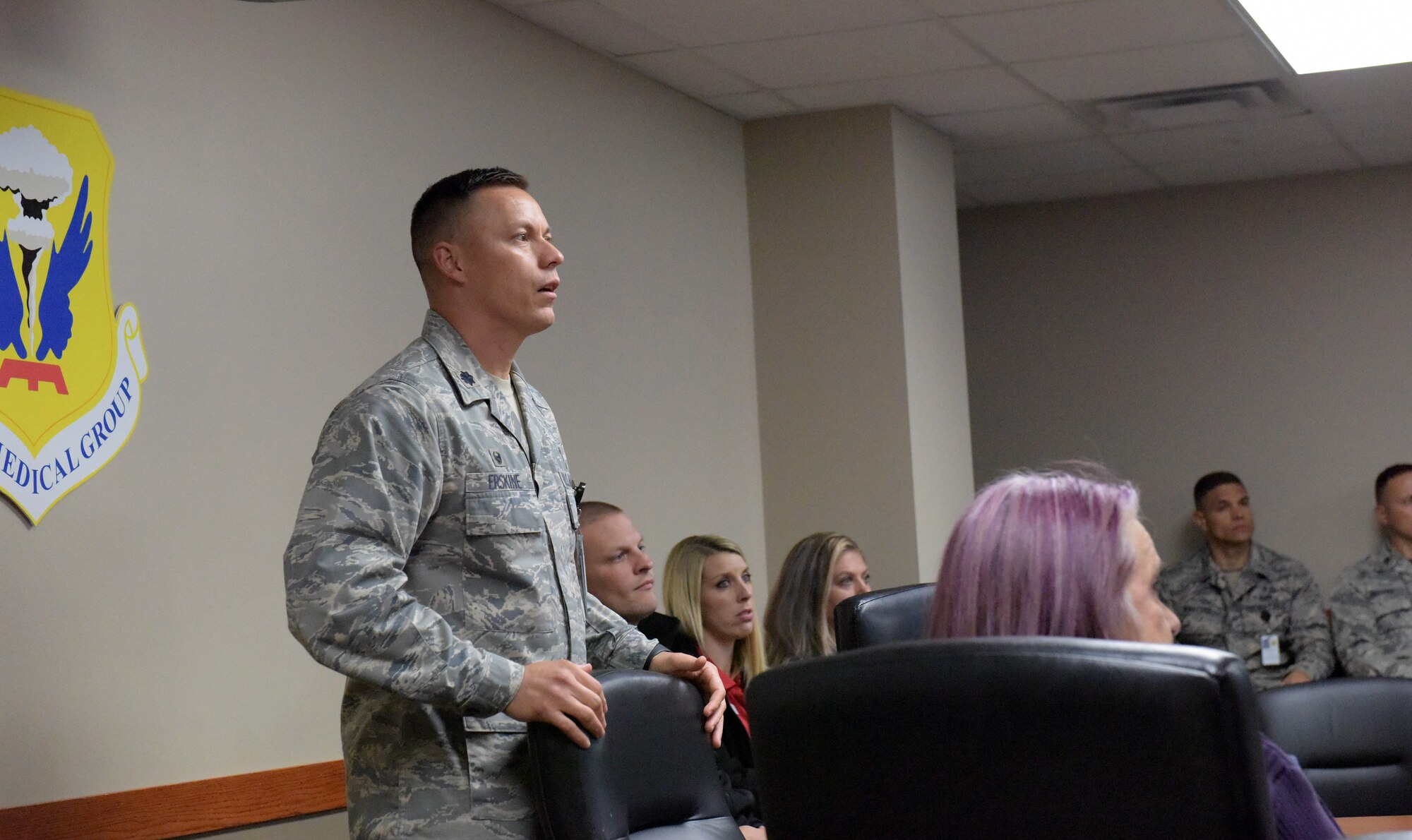 Lt. Col. Ian Erskine, the 509th Medical Support Squadron commander, briefs Tricare network providers Oct. 19, 2018 at Whiteman Air Force Base, Missouri. Regional providers, including those from Warrensburg, Knob Noster and Sedalia, Missouri, came to the installation to learn the mission, see how their services support it and get up close with a B-2. (U.S. Air Force photo by Staff Sgt. Joel Pfiester)