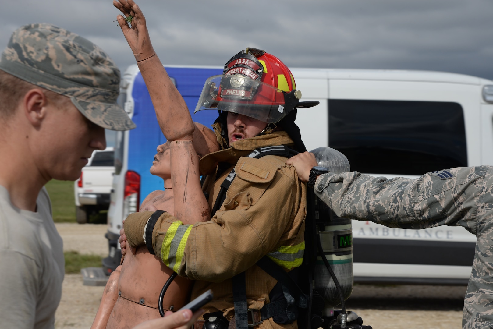 Senior Airman Patrick Sullivan, 902nd Security Forces Squadron, drags a dummy during the firefighter fitness challenge portion of the Battle of the Badges competition Oct. 20, 2018, at Joint Base San Antonio-Randolph’s Camp Talon. The initiative was designed to build stronger bonds between the agencies and has become a tradition for the unit members, their families and friends.